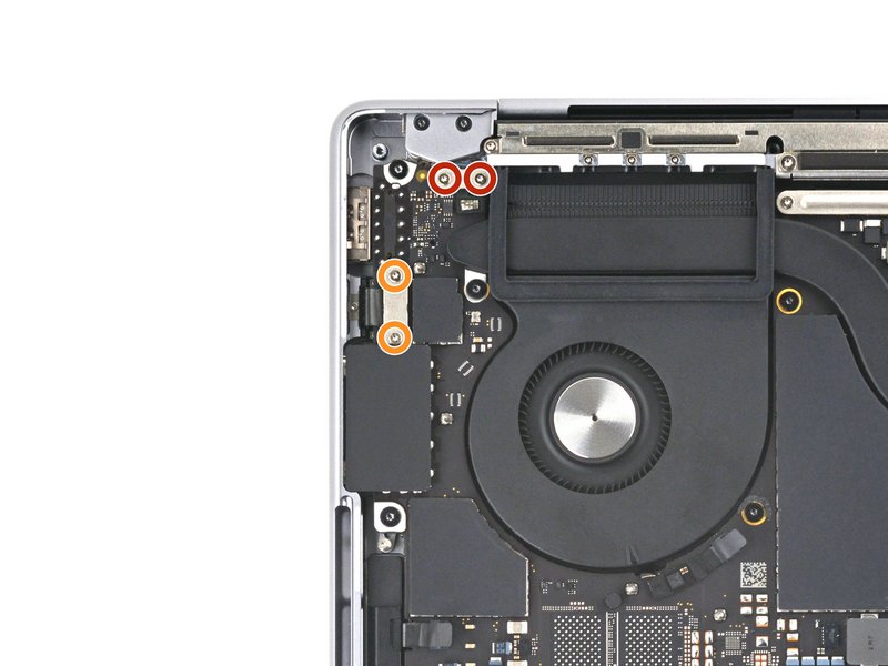 Dévisser les caches côté gauche MacBook Pro 14 pouces 2021 A2442 carte mère étape 39